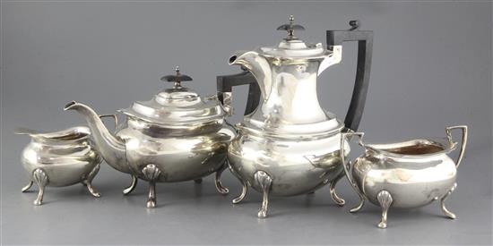 A 1930s four piece silver oval tea set, by Walker & Hall, gross 65 oz.
